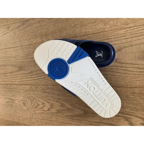 Louis Vuitton LV Trainer Mule in blue suede.