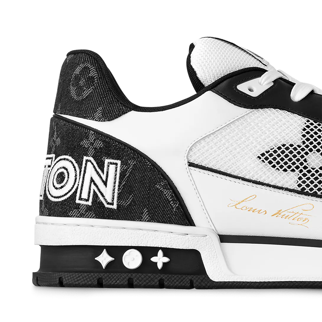 Louis Vuitton LV Trainer sneakers in a black and white colorway.