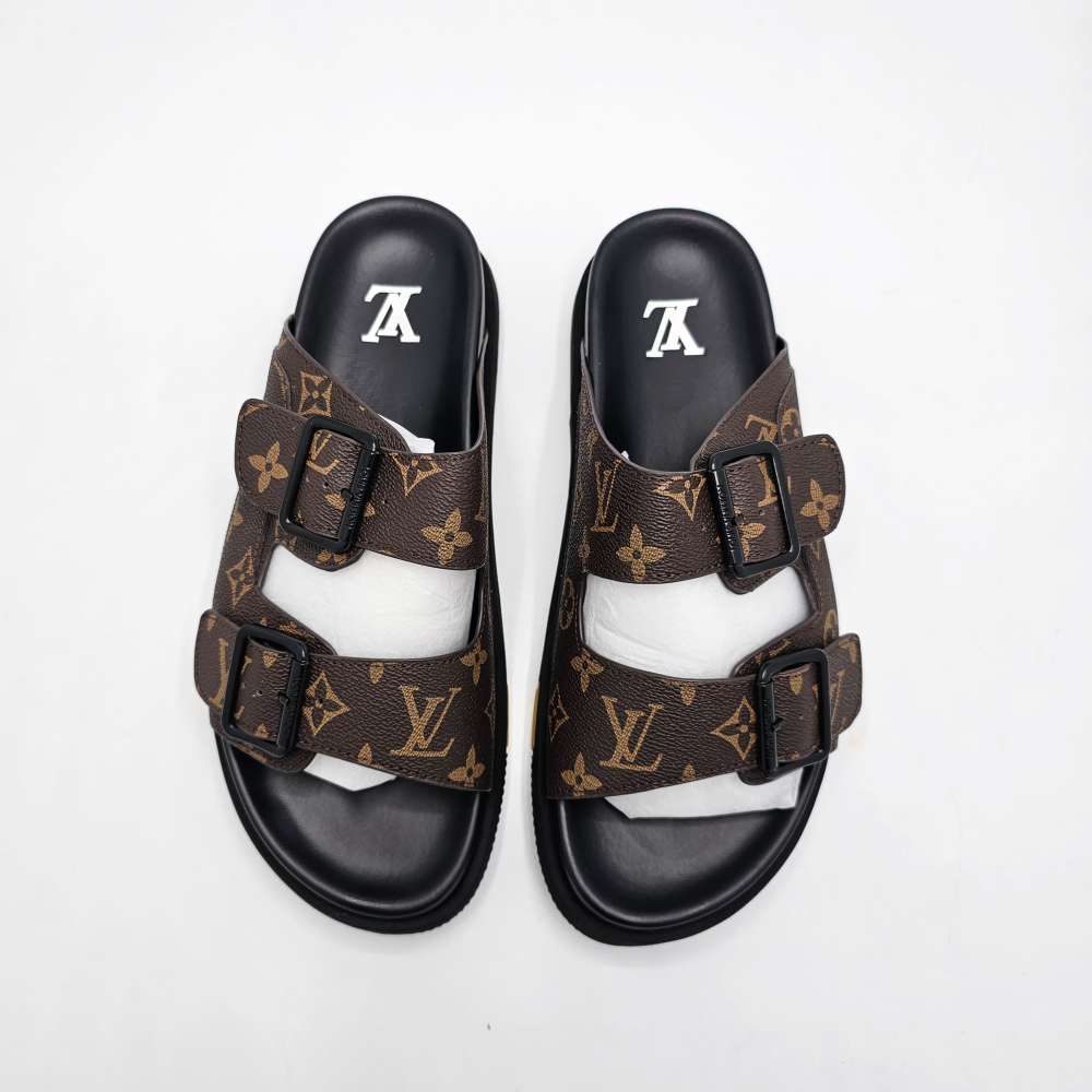 Louis Vuitton Lock It Flat Mules.