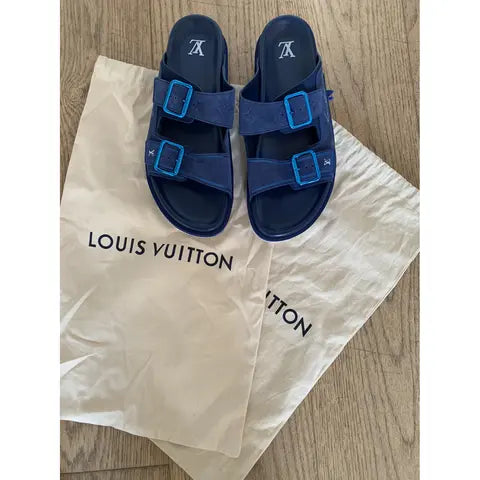 Louis Vuitton LV Trainer Mule in blue suede.