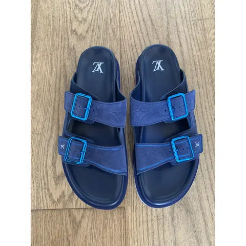 Louis Vuitton LV Trainer Mule in blue suede.