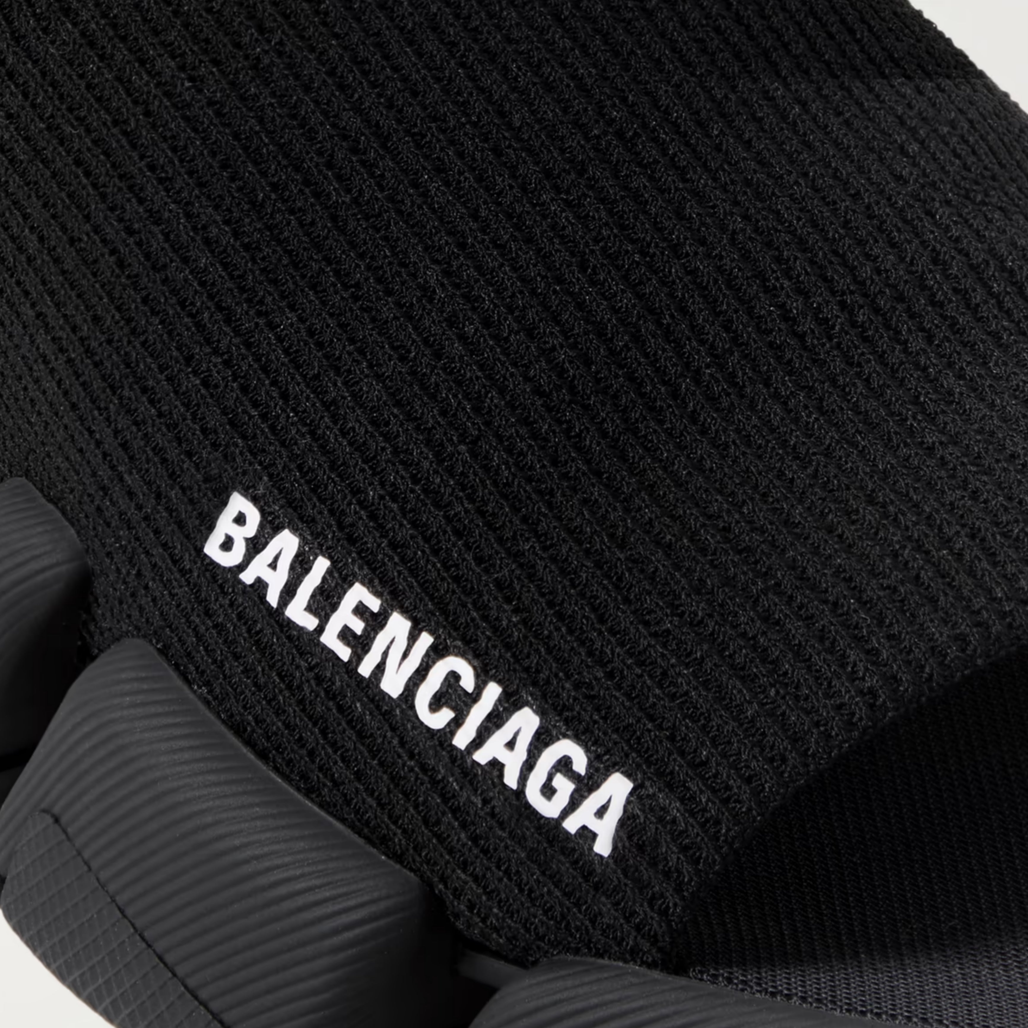 Balenciaga Speed 2.0 recycled-knit slides in black.