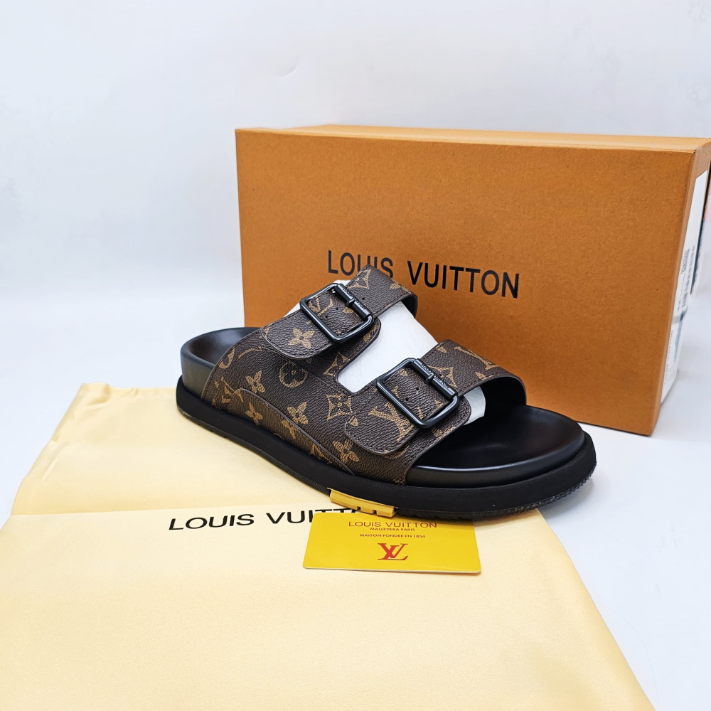 Louis Vuitton Lock It Flat Mules.