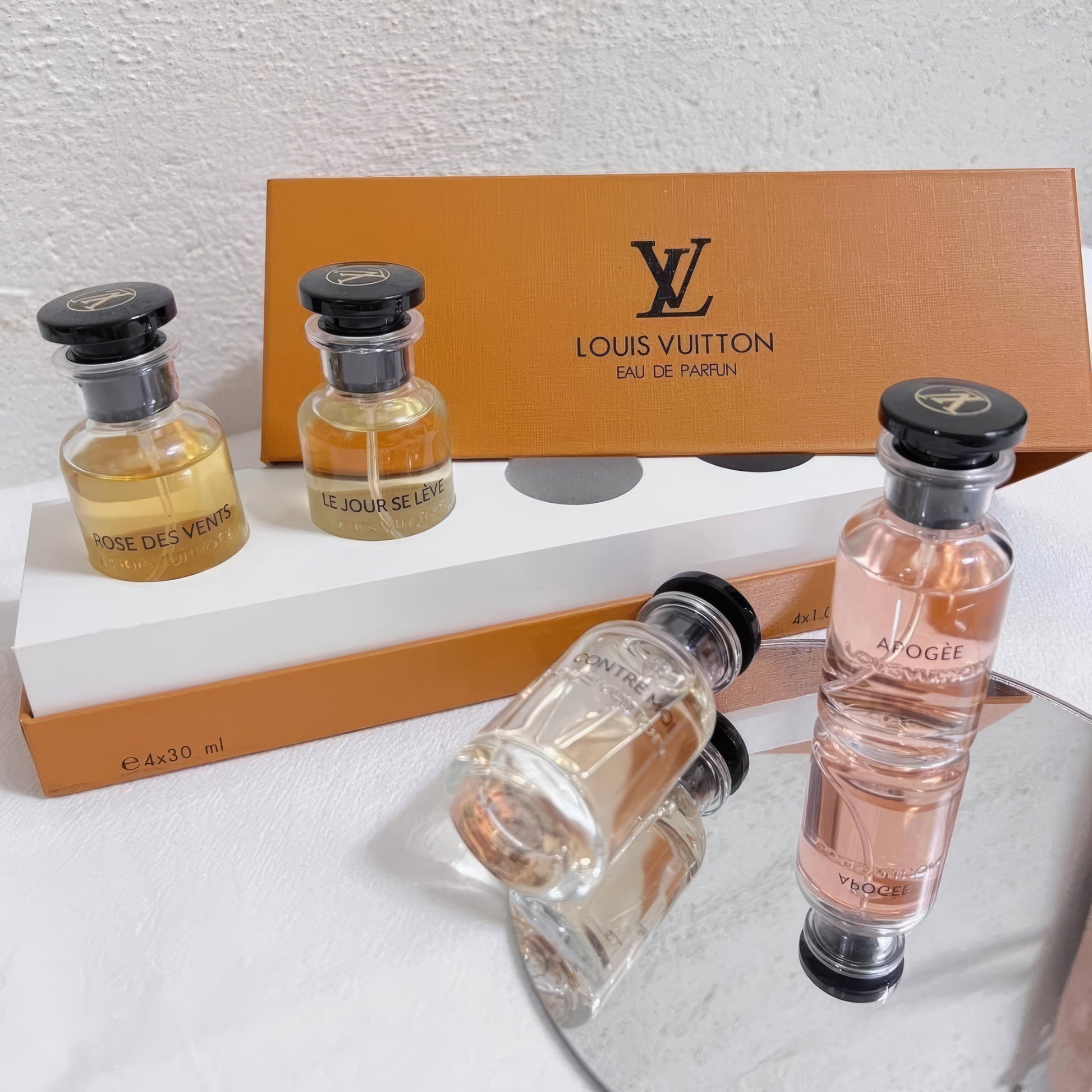 Louis Vuitton Miniature Set of four 30ml Eau de Parfum bottles.
